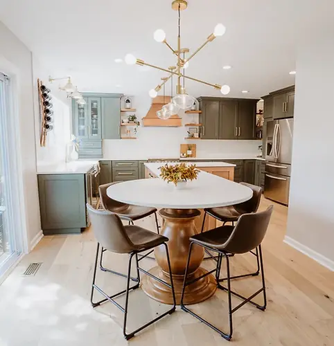 Dining room with statement lighting